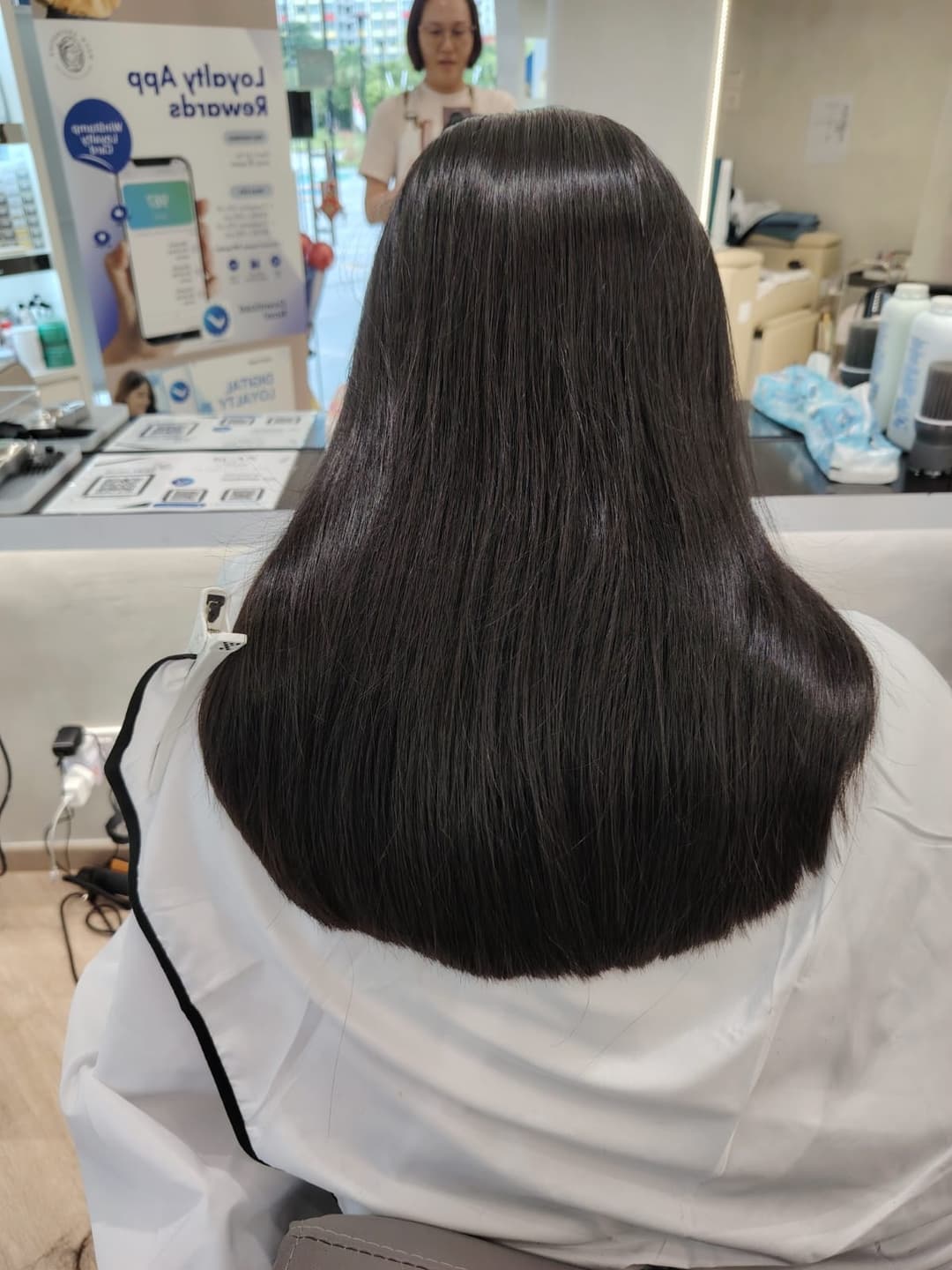 long straight black hair after rebonding in Tampines salon