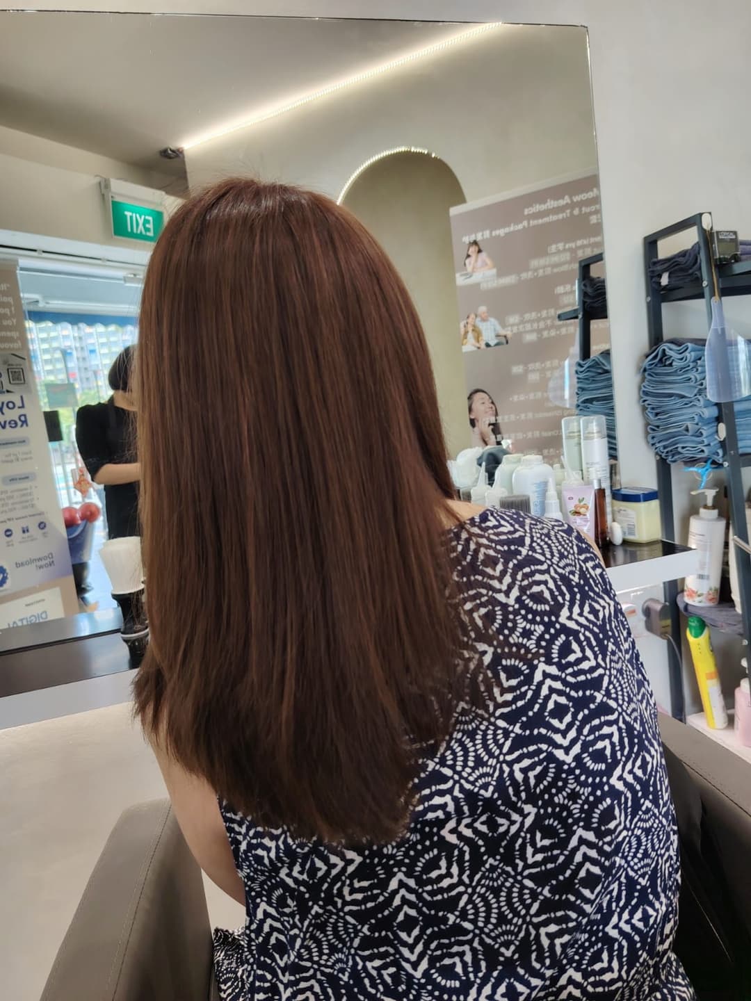 hair colouring service result with brown shade in Tampines